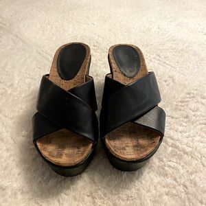 Black leather and cork platform wedge.